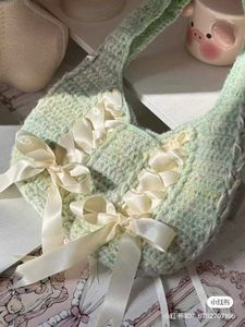 Crocheted Hobo Bag with Ribbon Bows