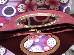 ladies maroon sling bag peacock laser cut