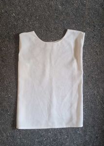 Cream Colored Sleeveless Blouse