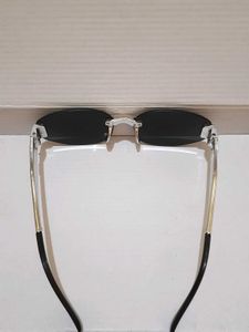 Celine Oval Rimless Sunglasses