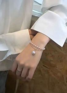 Elegant Pearl Charm Bracelet