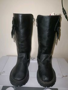 Black Leather Boots with Bow Detail