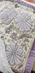 White and purple georgette saree