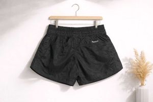 🖤 Reebok Black Parachute Shorts - Luxe-Worthy