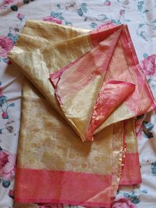 Elegant Gold Saree with Pink Border