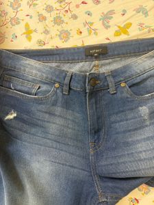 Distressed Denim Jeans
