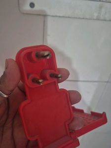 Red phone Shelf while charging