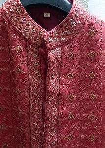 SHERWANI 36 SIZE RED COLOUR WITH HEAVY WORK IN IT FOR GRAND FUNCTIONS AND PARTIES READY TO USE CONDITION