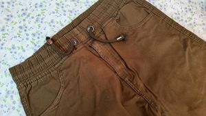 Denim Jacket with Pearls and Brown Pants