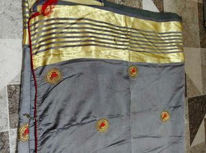 Elegant Grey Saree with Gold Border