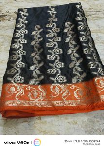 Elegant Black Saree with Floral Border