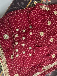 Elegant Maroon Saree with Gold Embroidery