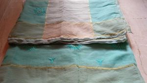 Beautiful Teal Saree with Intricate Embroidery