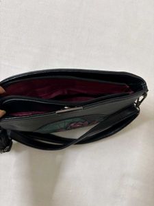 Black Leather Shoulder Bag with Lotus Design