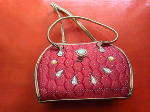 Elegant Red Embellished Handbag