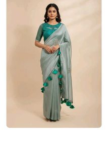 Stunning Teal Saree with Embellished Blouse