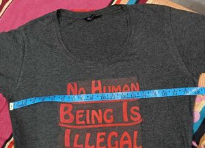 Statement T-Shirt - No Human Being Is Ille