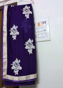 Elegant Purple Embroidered Saree