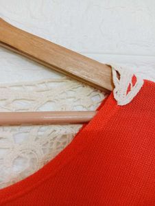 Orange Top with Lace Back Detail