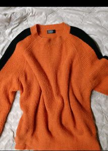 Orange Ribbed Knit Sweater with Black Stripes