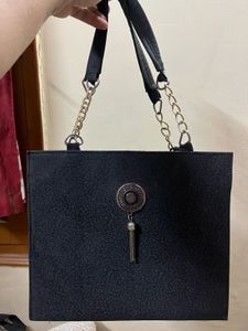 Chic Black Textured Handbag