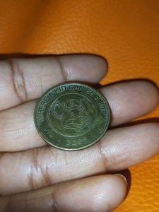 Rare Coin United States (USA) Arcade Token - Chuck E Cheese with letter "C" on the hat 2005 Where A Kid Can Be A Kid