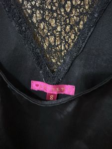 Chic Black Satin Romper with Lace Detail
