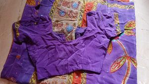 Vibrant Purple Saree with Floral Embroidery