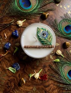 Decorative Candle with Flute &amp; Peacock Feather