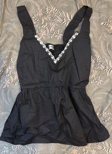 Chic Black Peplum Top with Lace Trim