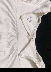 White eyelet detail top