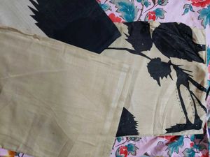 Elegant Beige Kurta Set with Black Leaf Print(unst