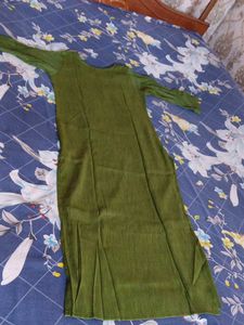 Elegant Green Kurta with Embellished Neckline