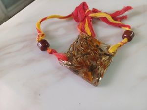 resin diamond shape floral rakhi