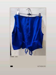 Vibrant Blue Sleeveless Button-Up Blouse