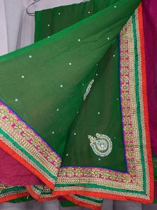 Elegant Heavy Green And Pink Embellished Saree