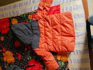 Orange Puffer Jacket with Grey Hood