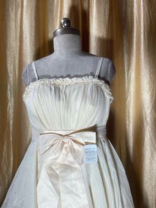 Elegant Cream Gown with Bow