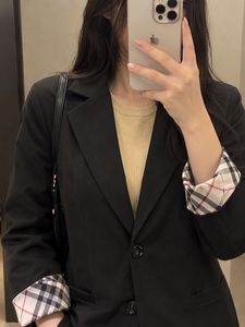 Classic Black Blazer with Tartan Lining