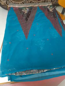 Party Wear Saree.Belive Me Its Too Preety, I Dont Wear Sarees So M Selling.Beautiful Sequence Pattern.colour Is Dark Green ,not Blue