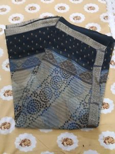 Elegant Black Saree with Blue Bandhej  Print