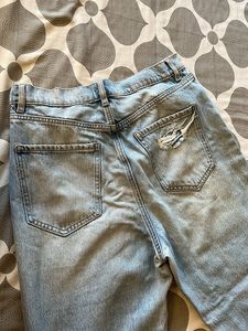 Distressed Light Wash Denim Jeans
