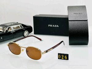 Prada Oval Sunglasses