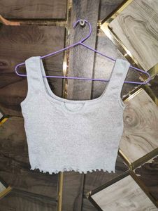 Grey Ribbed Lettuce Hem Crop Top