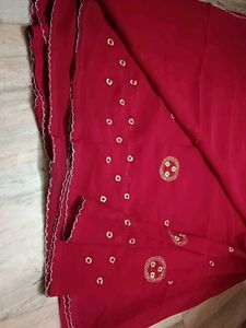 a beautiful red saree