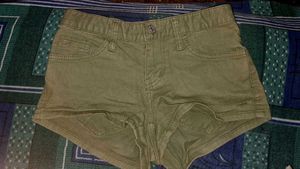 green denim shorts