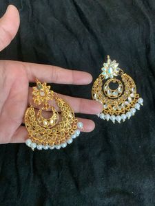 Exquisite Gold Jhumka Earrings with Pearls