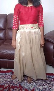 designer red and cream gown