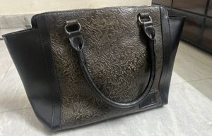 thia black leather handbag