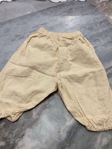 Cream Textured Palazzo Pants